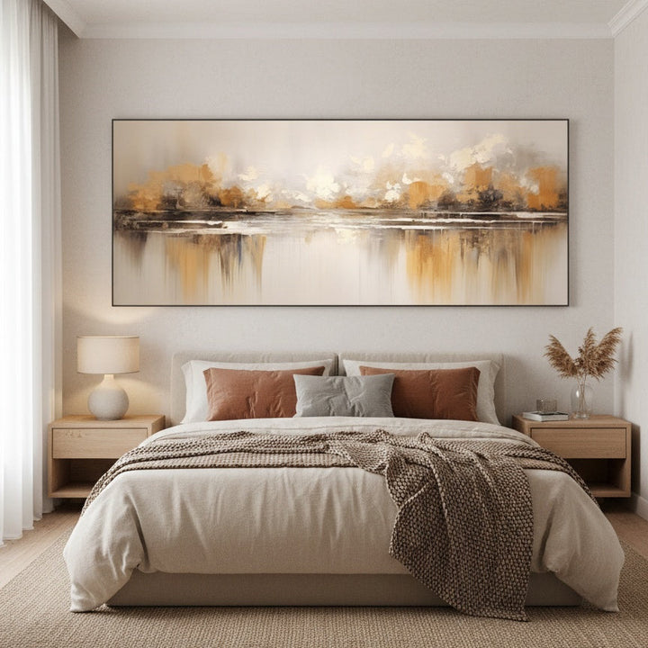 Modern bedroom with abstract wall art, bed, and side tables.