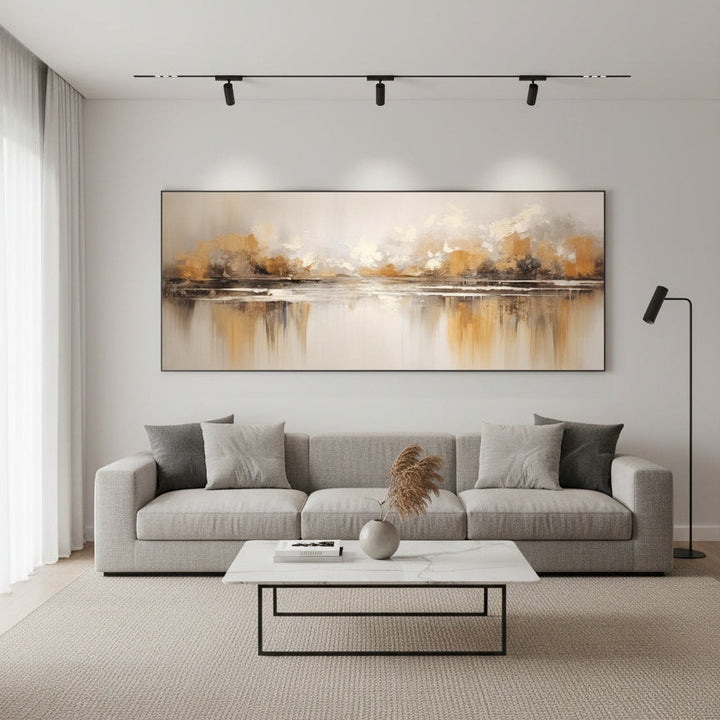 Modern living room with a large abstract painting above a gray sofa.