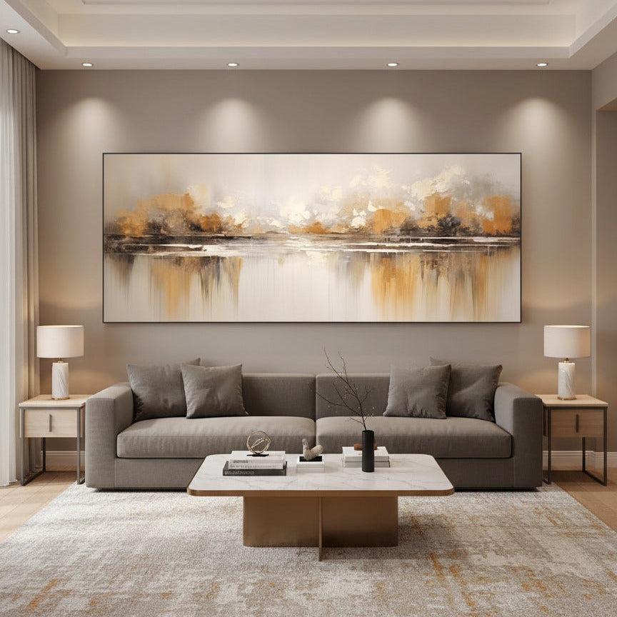 Modern living room with a gray sofa, coffee table, and abstract painting on the wall.